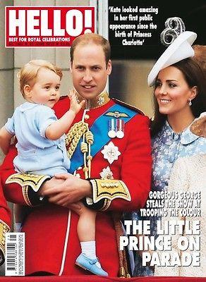 Kate Middleton & Prince Williams with Prince George on the cover of Hello Magazine